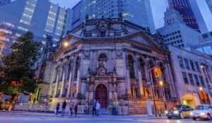 Hockey Hall of Fame with many people standing in front of it