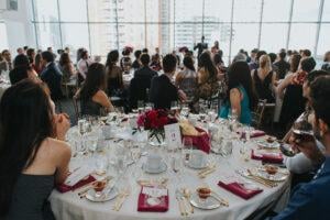 a group of people sitting at a table