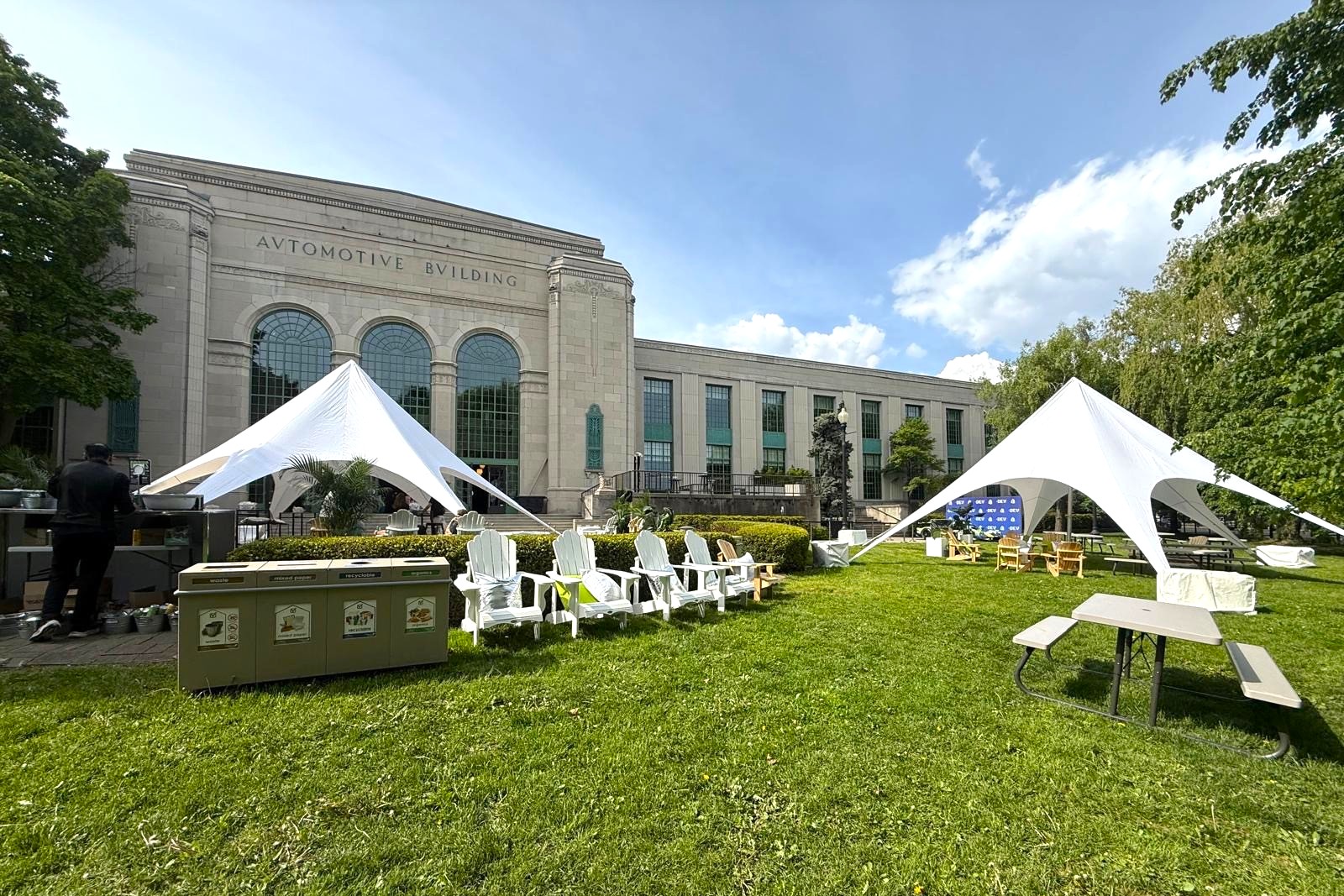 Tents set up near a building.