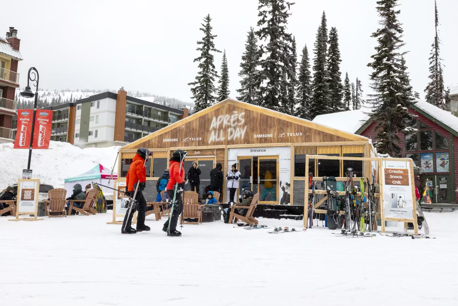 Skiers at an après-ski tent