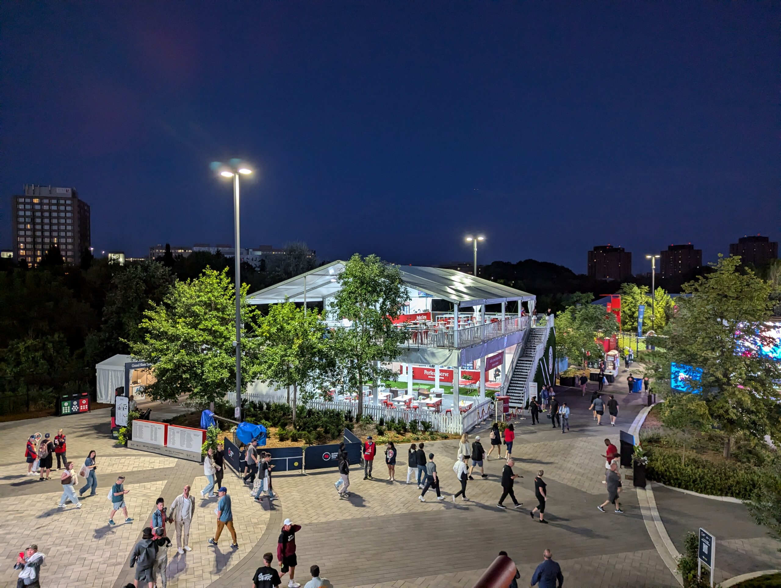 Busy outdoor venue at night