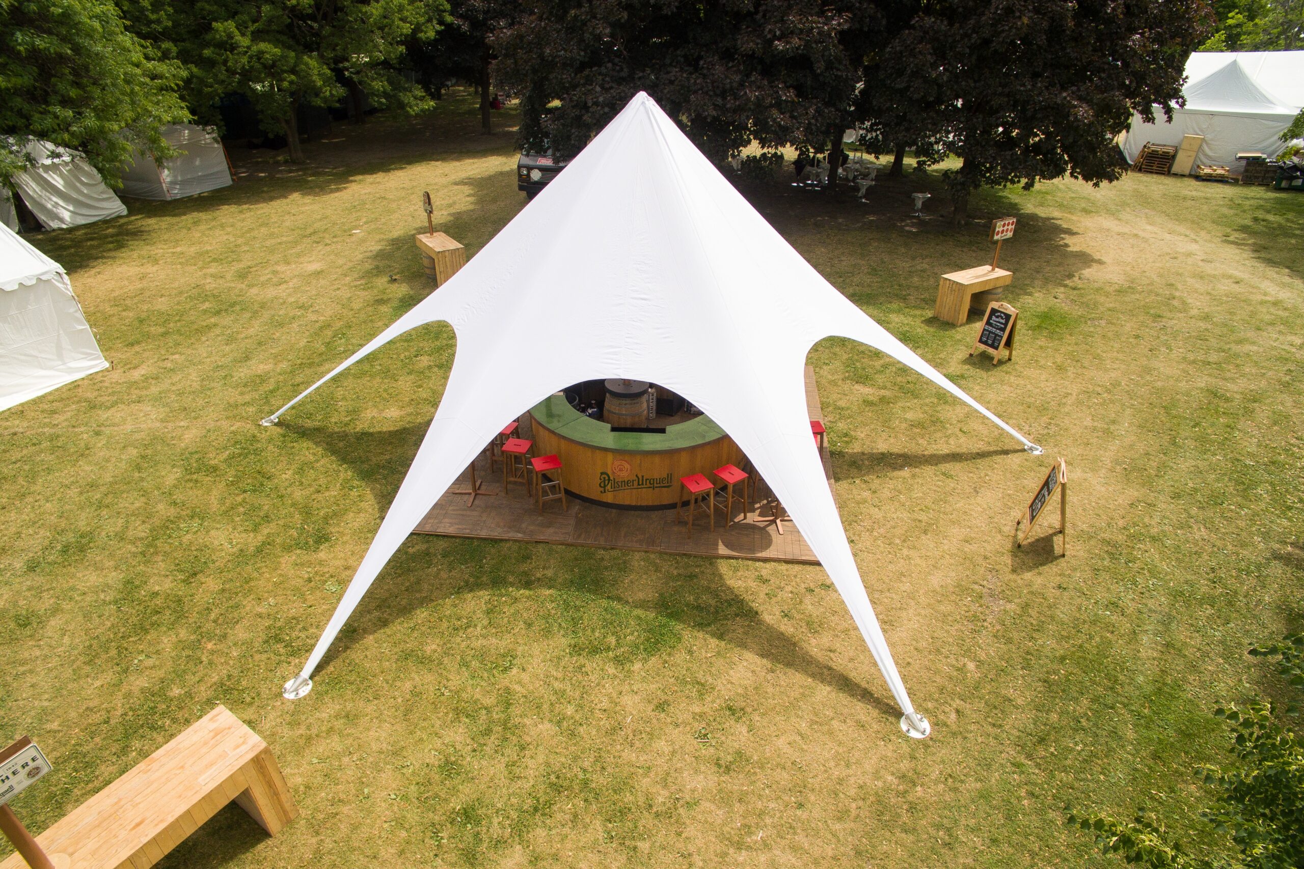 White tent over outdoor seating area