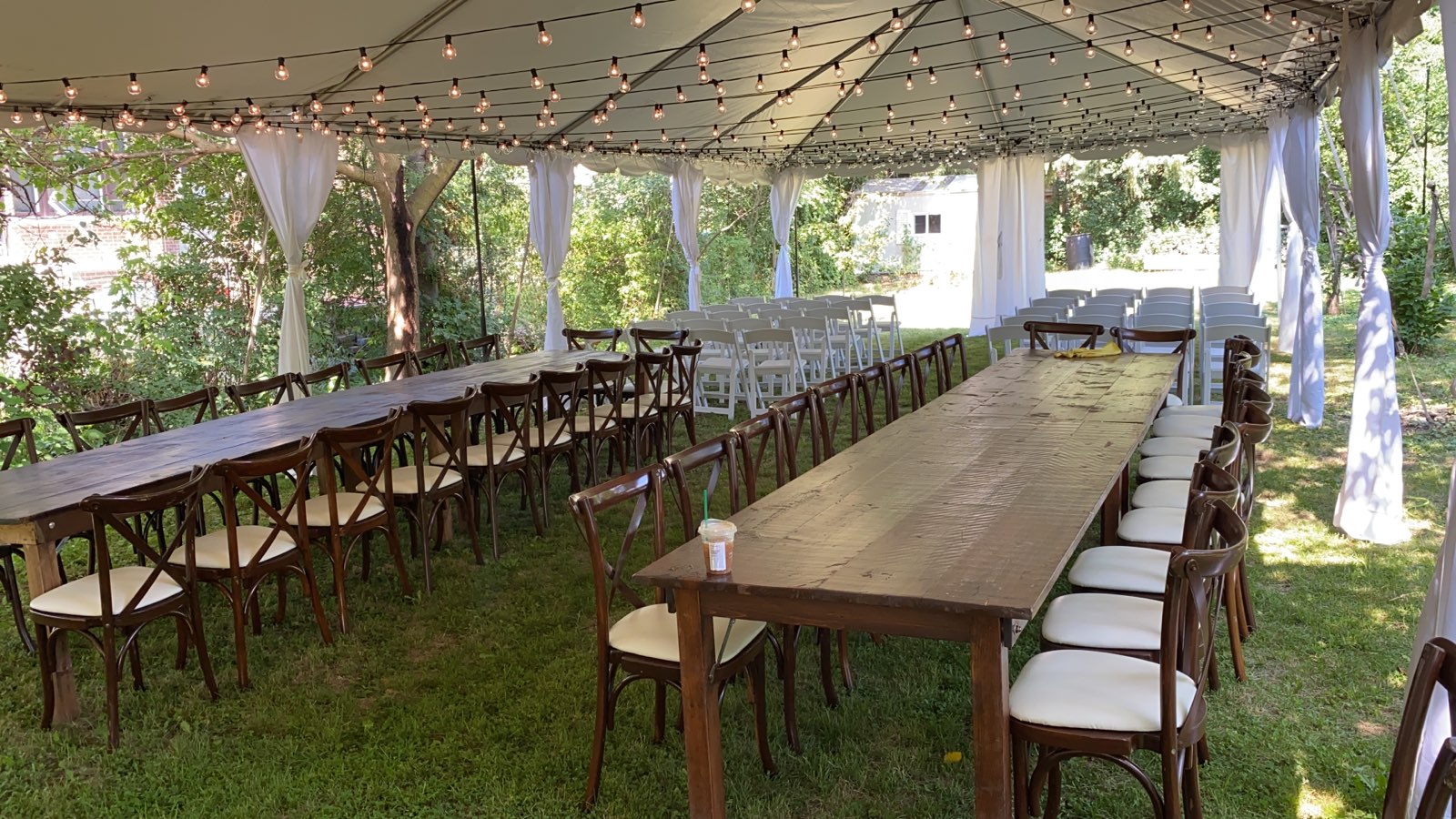 Outdoor event tent with string lights