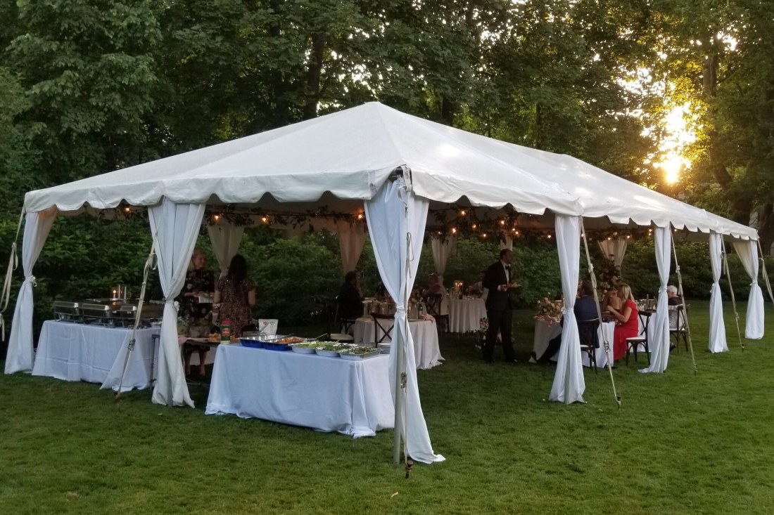 Outdoor event tent with decorations and food and Frame tent